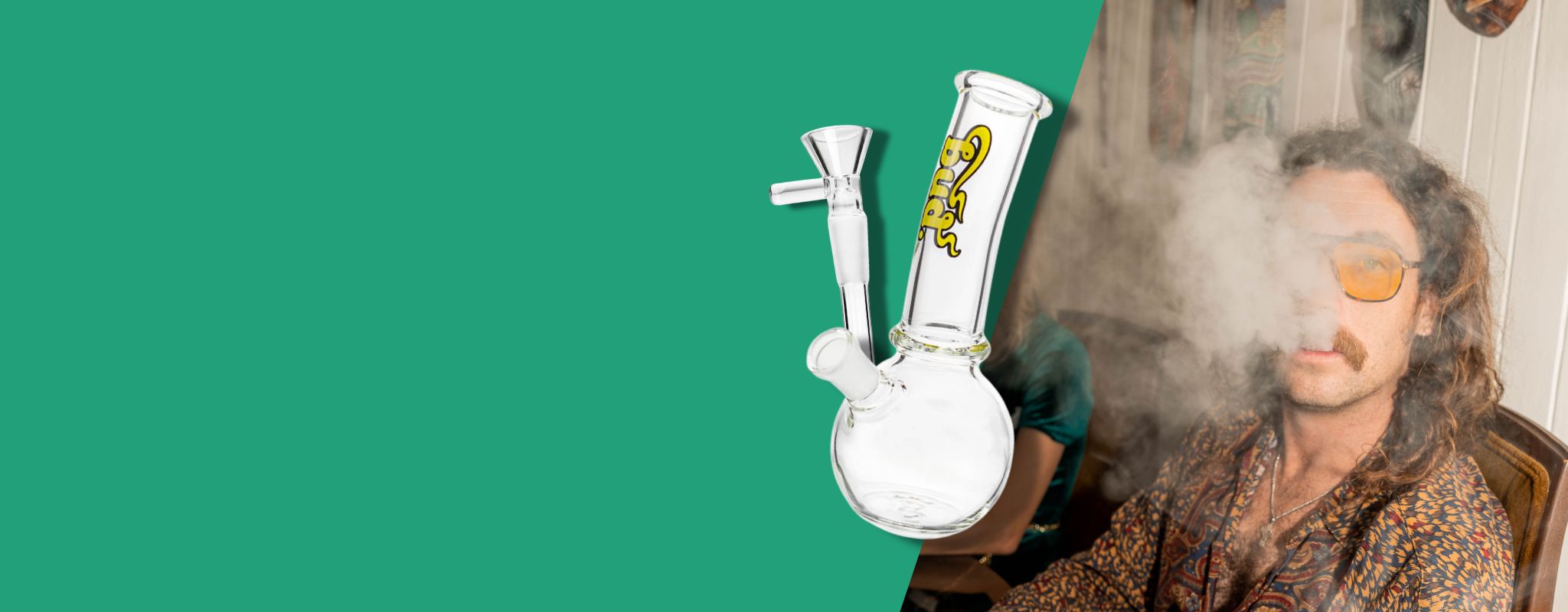 Man exhaling smoke from Bud Bubble Bong