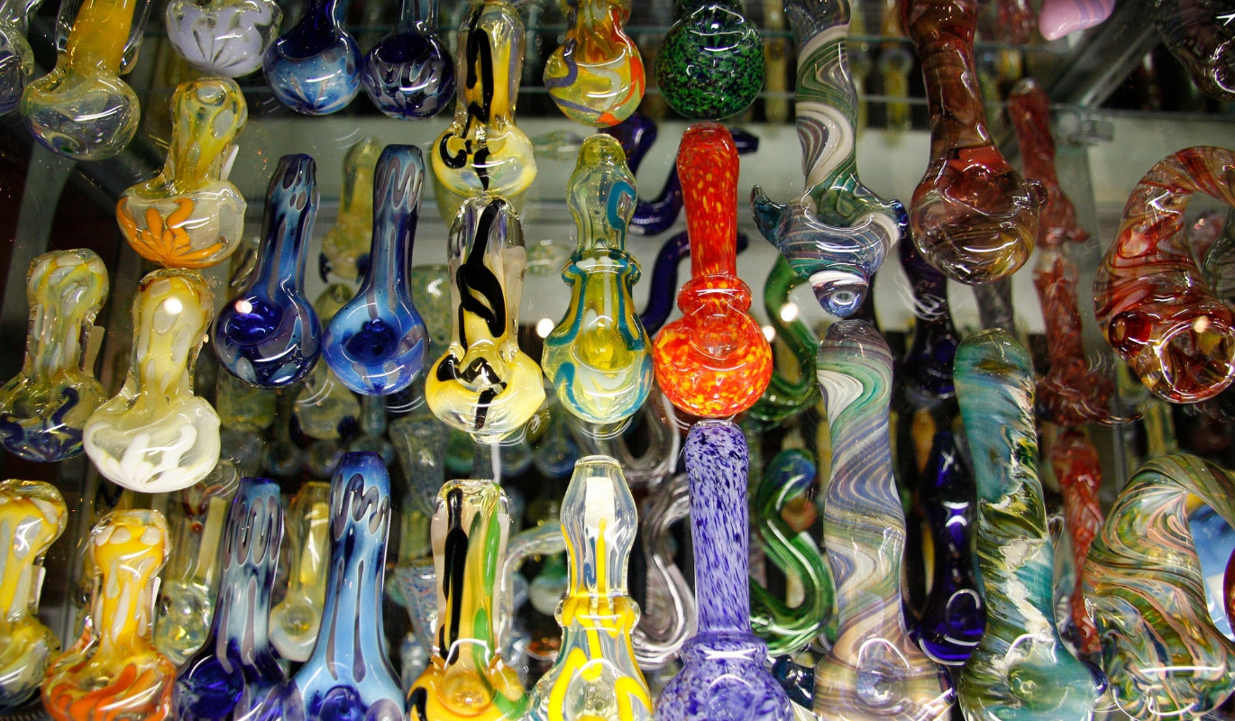 Dozens of colourful glass pipes