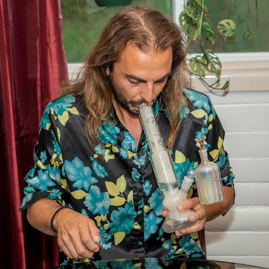 Man smoking Higher Concepts Tree Percolator Bong with ash catcher