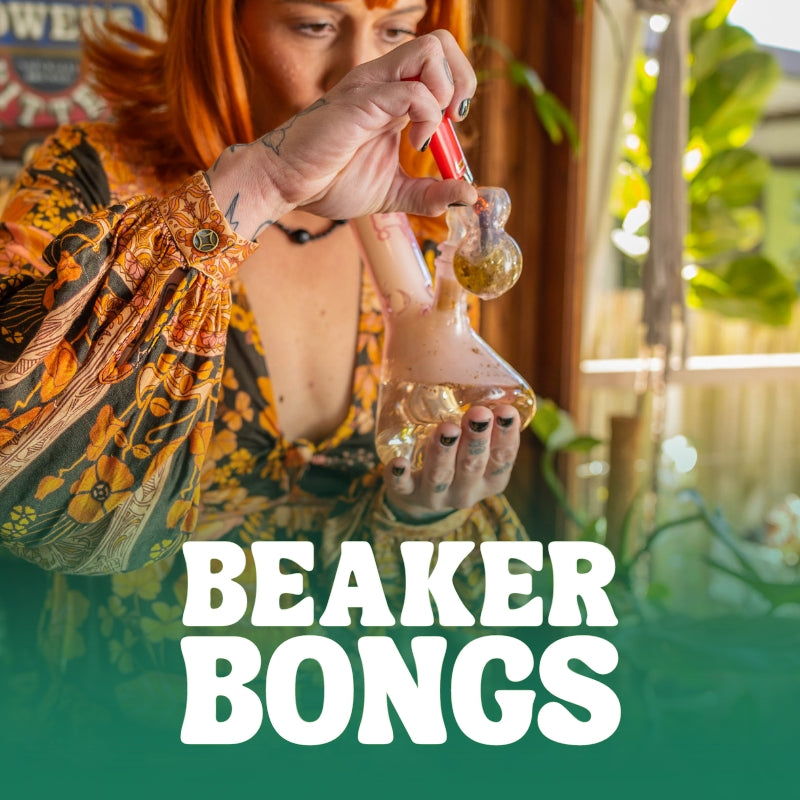 Woman smoking from a beaker bong