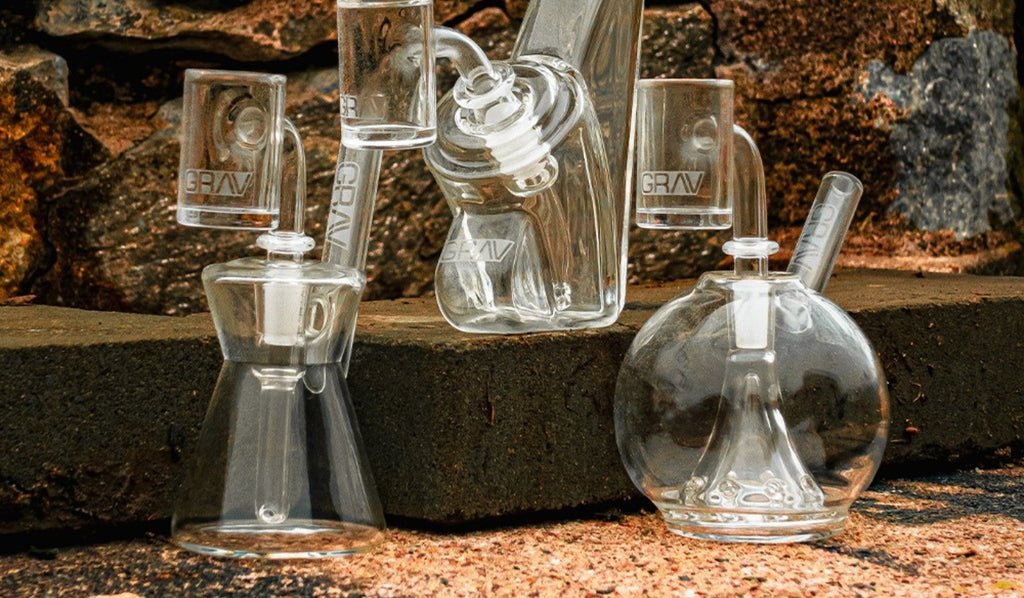 Three glass dab rigs on concrete