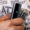 A hand holding a weed vaporizer