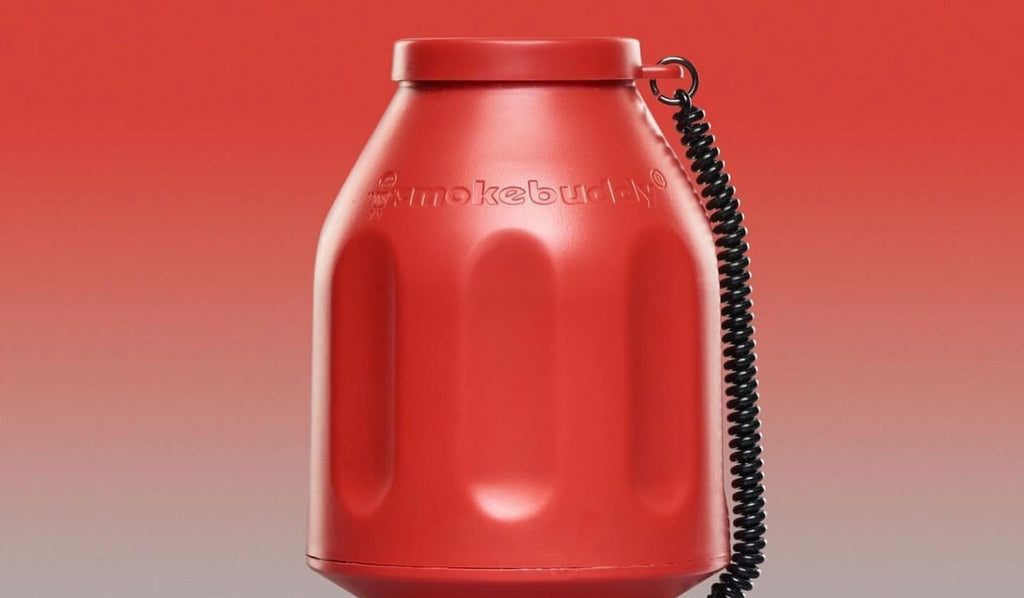 A red Original Smoke Buddy Personal Air Filter