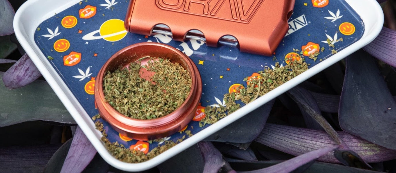 An open GRAV grinder with cannabis