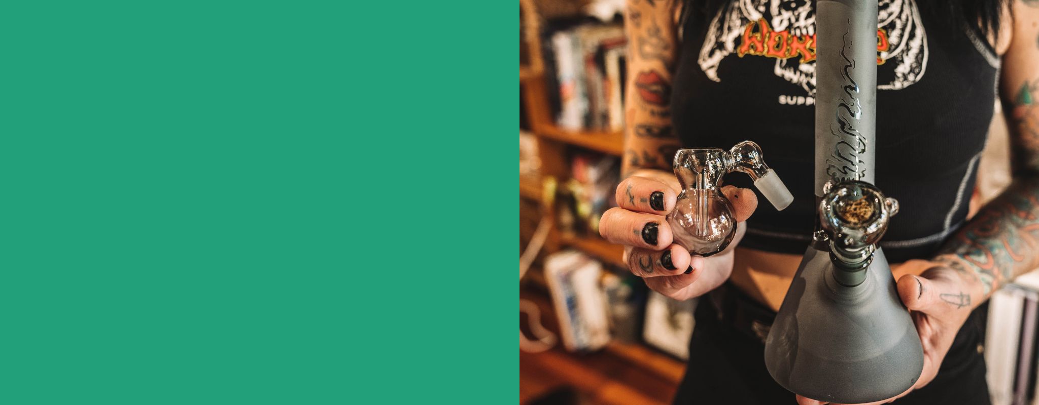 Person holding a beaker bong and glass ash catcher