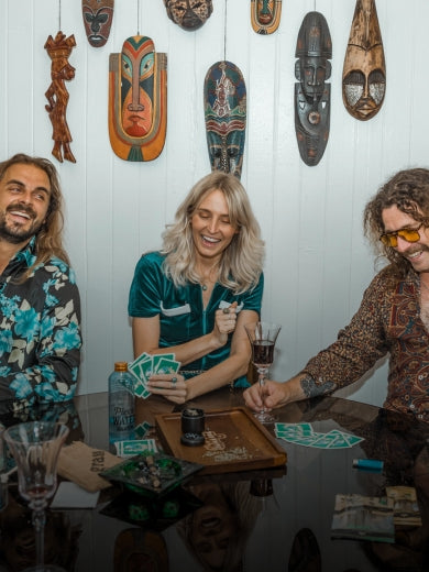 Group of friends smoking around a dining table