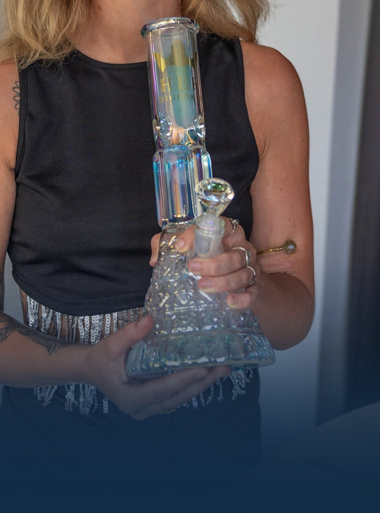 Woman holding Her Highness glass bong
