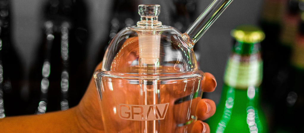 Hand holding GRAV Slush Cup Glass Bong