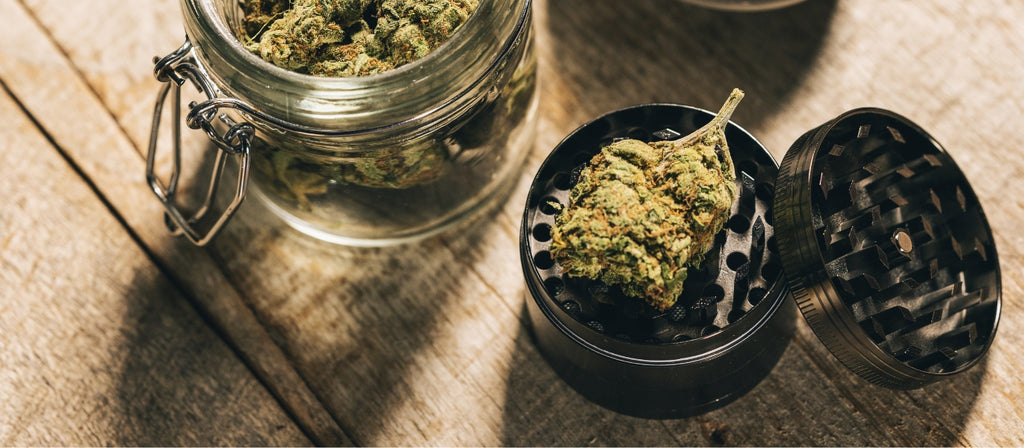 Metal weed grinder with cannabis