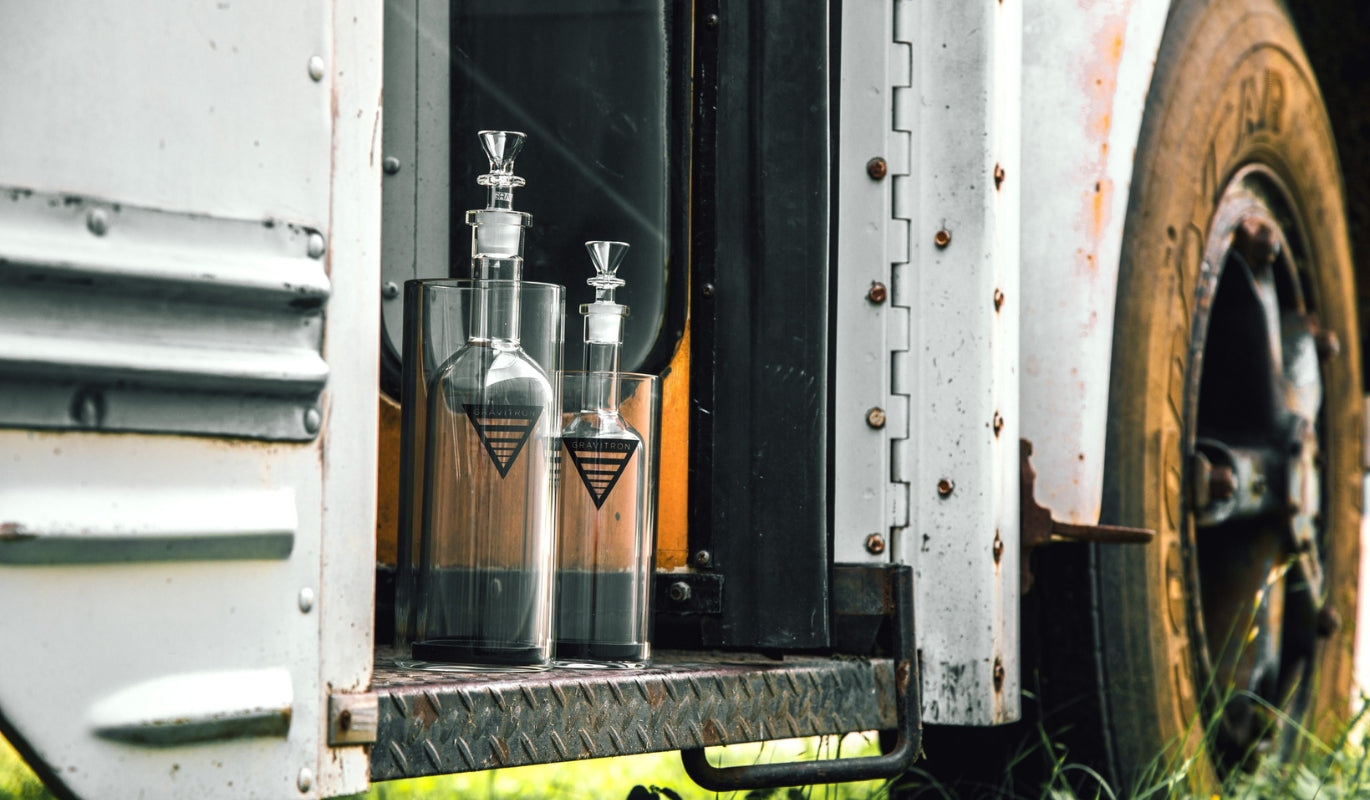 Two GRAV Gravitron gravity bongs on a truck