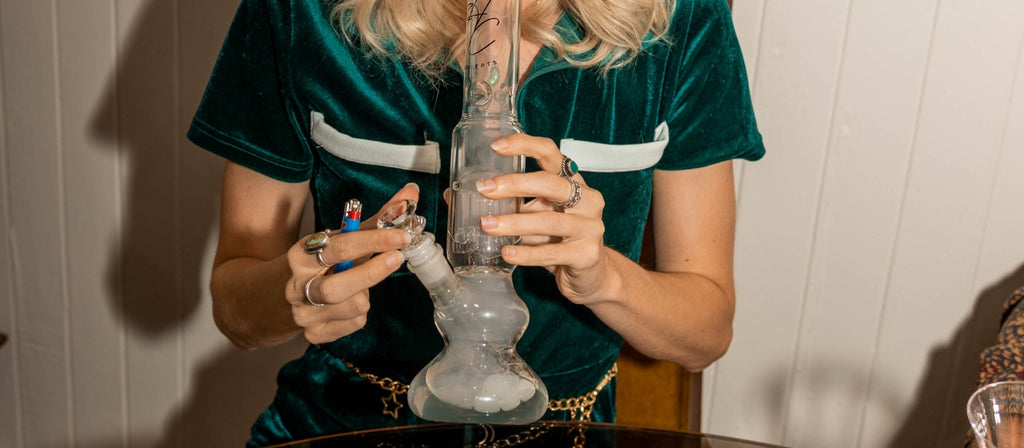 Woman smoking from a Higher Concepts Tree Percolator Bong