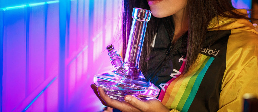 Woman holding a GRAV glass bong