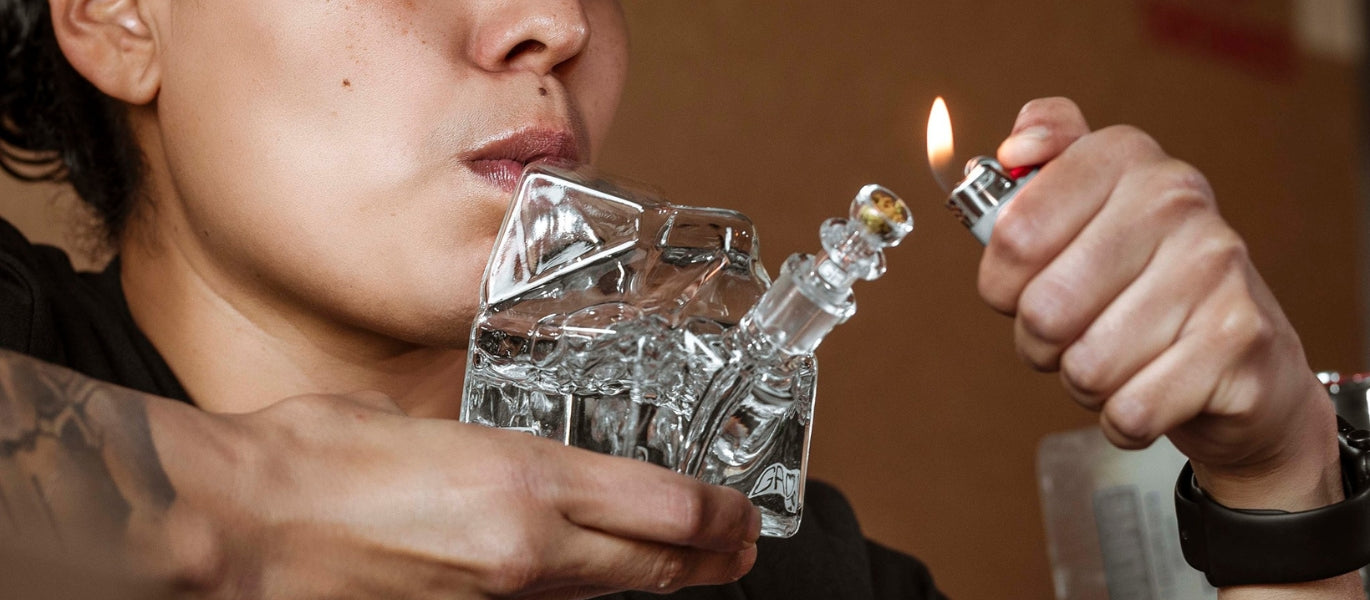 Woman smoking GRAV Milk Carton Bong